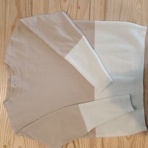 Poof Apparel Tan/Cream color block sweater.